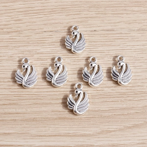Set of six swan-shaped alloy charms in vintage silver finish for DIY jewelry making