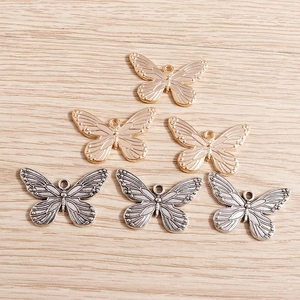 Set of 6 gold and silver butterfly charms with vintage texture for DIY jewelry making