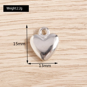 Detail view of 3D heart pendant showing 15mm height and 13mm width dimensions