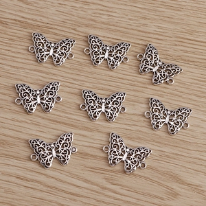 30pcs vintage hollow butterfly charms in antique silver alloy for DIY jewelry crafting