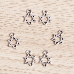 Bulk pack of silver plated alloy star charms with hanging loops for DIY jewelry making