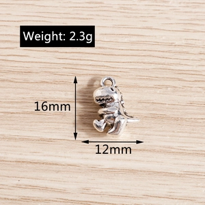 Macro view of cartoon dinosaur alloy charm with size dimensions 16mm by 12mm