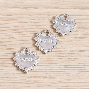 Silver alloy heart-shaped pendants with LOVE engraving and floral edges for DIY jewelry making