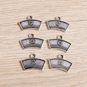 Set of six antique silver nurse hat pendants made of plated alloy for DIY jewelry crafting