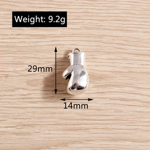 Polished silver alloy boxing glove pendant showing dimensions 29mm height and 14mm width