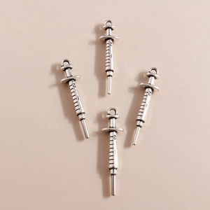 Set of antique silver syringe pendants in alloy for DIY jewelry and necklace crafting
