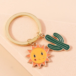 Porte-clés pastoral tournesol et cactus avec pendentif soleil et anneau doré