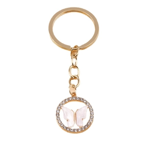 Elegant gold-tone butterfly keychain with rhinestone bezel and mother of pearl inlay