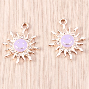 Rose gold sunflower charms with purple enamel smiley face and sparkling rhinestones