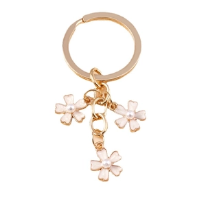 Porte-clés fleurs de cerisier roses avec anneau doré et pendentifs perles