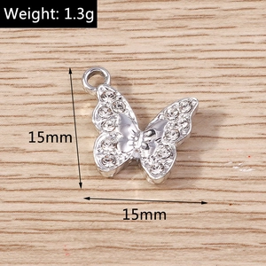 Detailed view of a 15mm sparkling butterfly charm with micro-pave crystals and dimensions