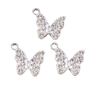 Three elegant silver butterfly charms with sparkling rhinestones for DIY jewelry making
