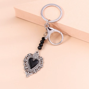 Gothic butterfly heart keychain with black beads and silver metal baroque filigree frame