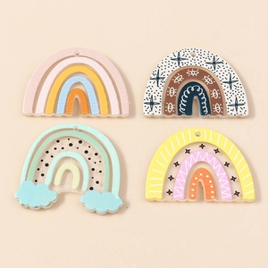 Set of four colorful cartoon rainbow resin pendants for DIY jewelry and keychain making
