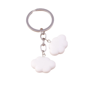 Cute white cloud charms keychain with silver metal ring on a clean white background