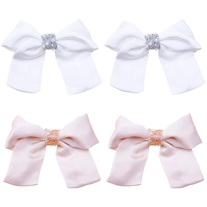 Set di quattro fiocchi per capelli in raso per bambine con perle e strass rosa e bianchi