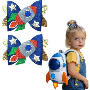 Children's glitter bow hair clips featuring space rocket and star designs for girls