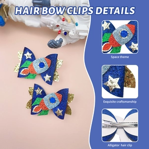 Detail view of space rocket glitter bow hair clips for kids with metal duckbill clip