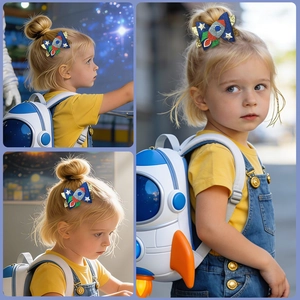 Close-up of glitter bow hair clip with cartoon rocket design for kids on blue background