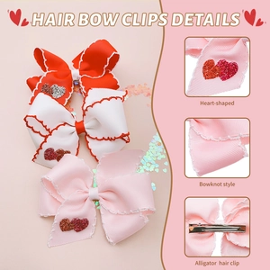 Tre fermagli per capelli in nastro grosgrain con bordi a balze e cuori glitterati