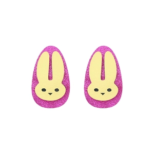 Detail of pink glitter Easter bunny hair clips with faux leather rabbit ears for girls