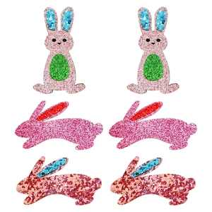 Glittery Easter bunny hair clips set for girls featuring pink and red rabbit designs