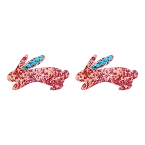 Close-up of pink sequined bunny hair clips with blue accents and detailed craftsmanship