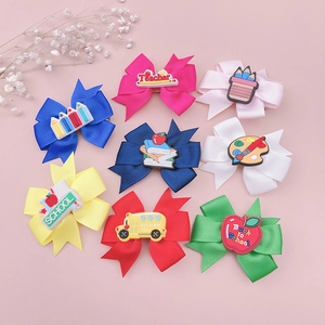 Set of 8 colorful school-themed hair bows with pencil and school bus resin charms