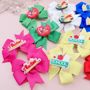 Colorful Back to School ribbon hair bows with pencils, apples and teacher theme designs