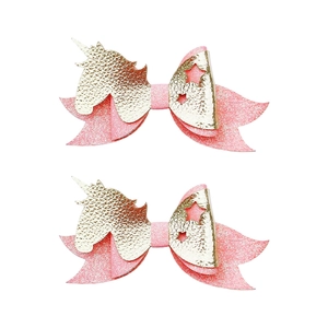 Pair of handmade unicorn bow hair clips with gold PU leather and pink glitter fabric