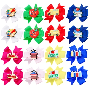 Set of 16 colorful back to school hair bows with school bus and pencil silicone patches