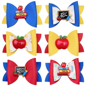 Lot de six nœuds à cheveux scintillants thème école avec motifs crayon et pomme