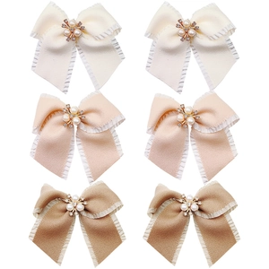 Set di 6 eleganti fermagli per capelli a fiocco con perle finte e dettagli dorati