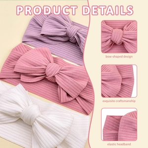 Close-up of ribbed texture and large bow detail on high elasticity infant headbands