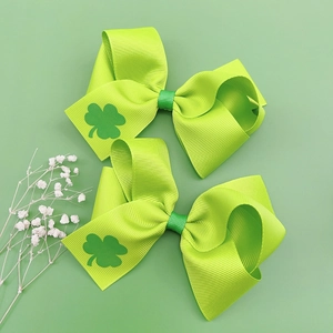 Lot de 2 nœuds pour cheveux Saint-Patrick en ruban gros-grain vert avec trèfles