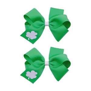 Paire de barrettes à nœud vert pour la Saint-Patrick en ruban gros-grain avec trèfle