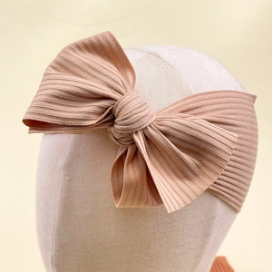 Pink ribbed knit bow headband for infants, high elasticity wide stretch hair band