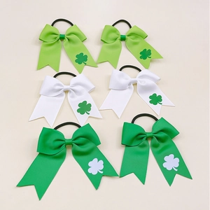 6-pack St. Patrick's Day clover bow hair ties in green and white grosgrain ribbon
