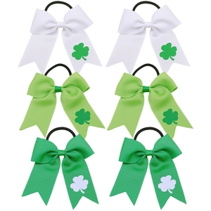 Set of 6 St. Patrick's Day hair bows with green shamrock prints on ribbed grosgrain ribbons