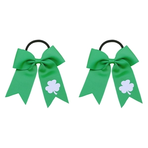 Detail of St. Patrick's Day green grosgrain ribbon bows with white shamrock print