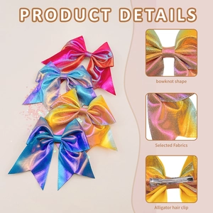 Close-up detail of laser leather bow hair clips with metallic texture and crocodile grip