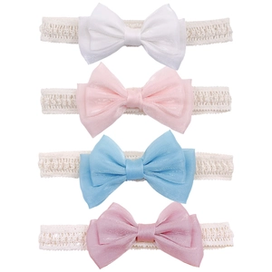 Detail of four baby lace headbands in white, pink and blue with silk satin bows