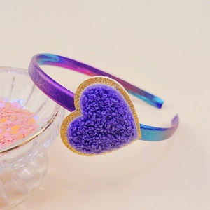 Detailed view of purple plush heart headband with gradient metallic laser fabric finish
