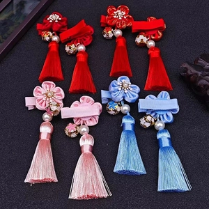 Set mit 4 Paaren traditioneller chinesischer Neujahrs-Haarspangen mit Quasten