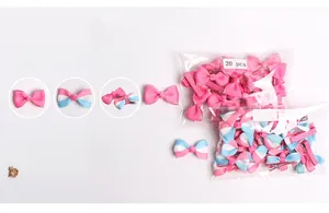 Detail of 20-piece baby bow hair clips set with pink striped patterns and metal clips