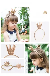 Detail of glitter crown headband for girls featuring golden lace floral elastic band