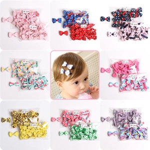 40-piece colorful bow hair clip set for girls with floral patterns and polka dots