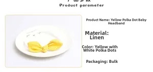 Detail of yellow linen baby headband with white polka dots and a cute bow tie design