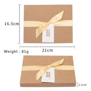 Brown kraft paper gift box with beige ribbon and handmade tag for girls hair accessory set