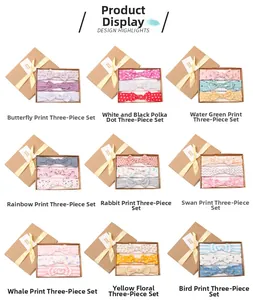 Close-up of 3-piece baby girl headbands in kraft gift boxes with various cute patterns